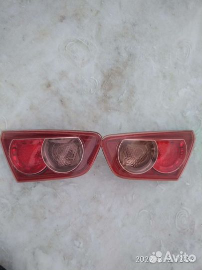 Фонарь задний Мицубиси Лансер 10