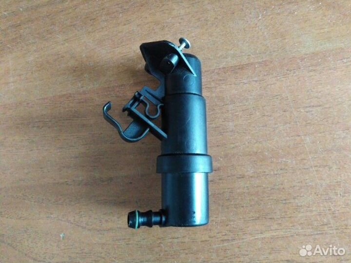 Форсунка омывателя фары левая Skoda Fabia 1999