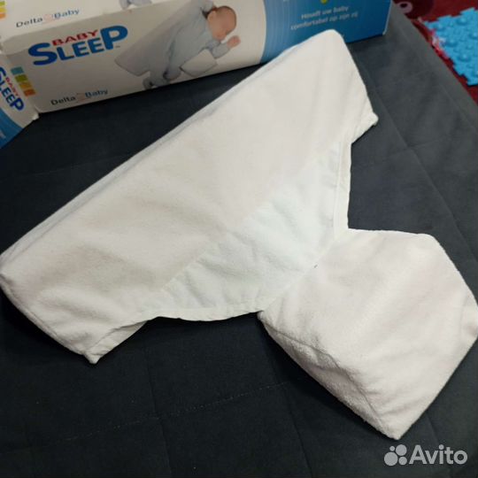 Подушка для новорождённых от переворотов во сне