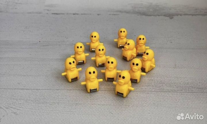 Игрушка уточки на горке