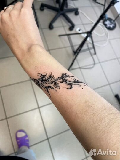 Тату-мастер