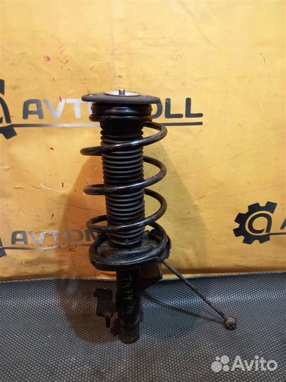 Стойка передняя левая mazda 3 BL