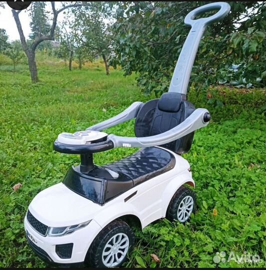 Машинка каталка с ручкой