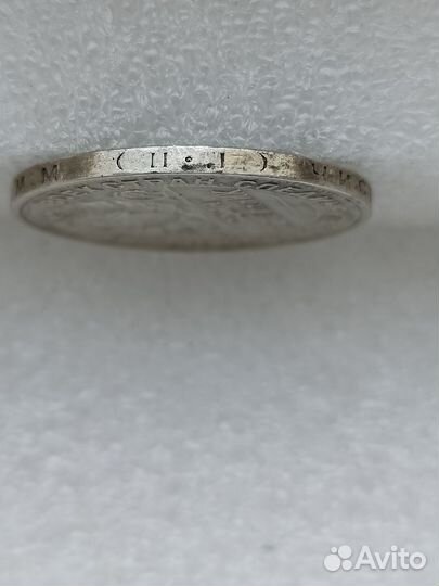 Монета один полтинник 1927 года, серебро РСФСР