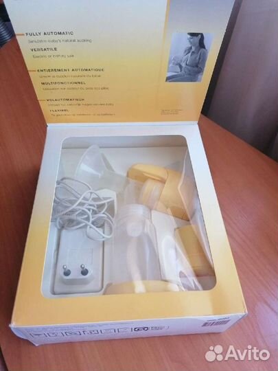 Молокоотсос medela электрический