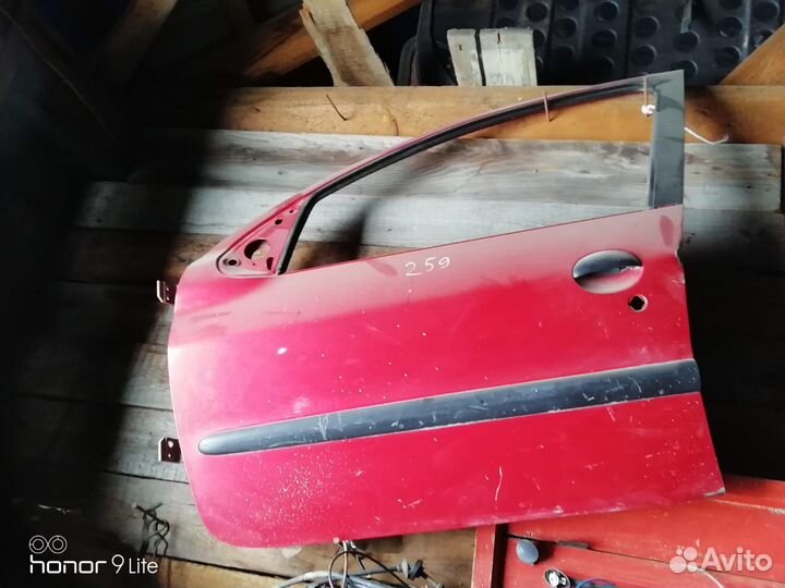 Дверь передняя левая Пежо 206