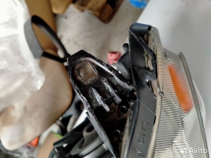 Фара левая lancer 10