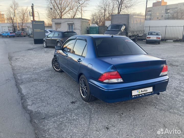 Mitsubishi Lancer 1.6 МТ, 2003, 100 000 км