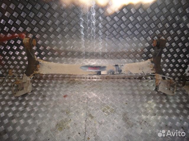 Балка задняя Emgrand (09) б/у (арт. 1064001049)