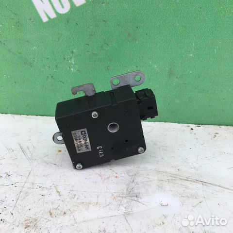 Моторчик заслонки отопителя Киа Спектра