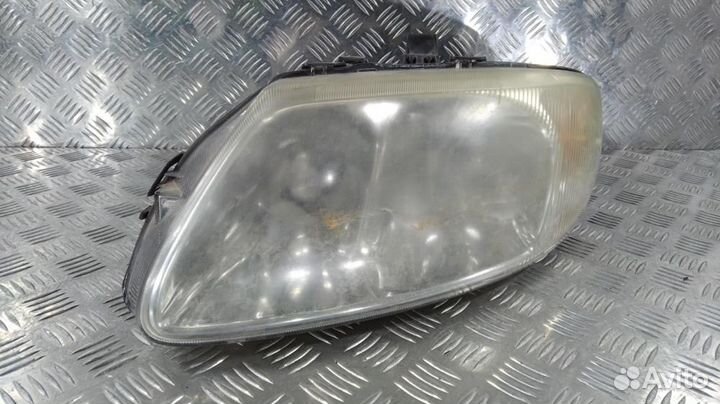 Фара 04857703AB Chrysler Voyager (2001-2007)