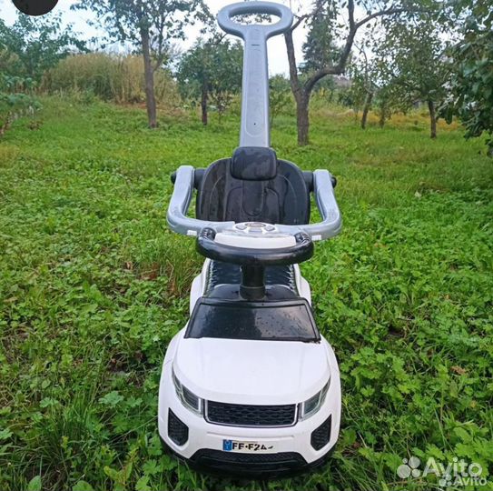 Машинка каталка с ручкой
