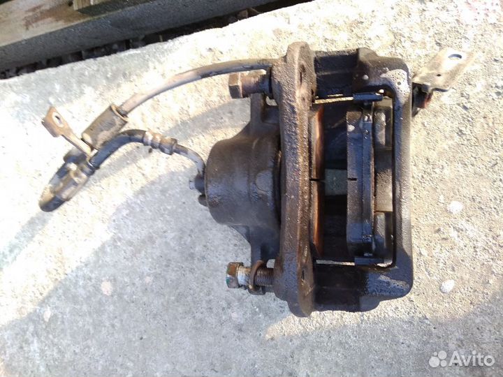 Суппорт тормозной передний левый Elantra 10-13г