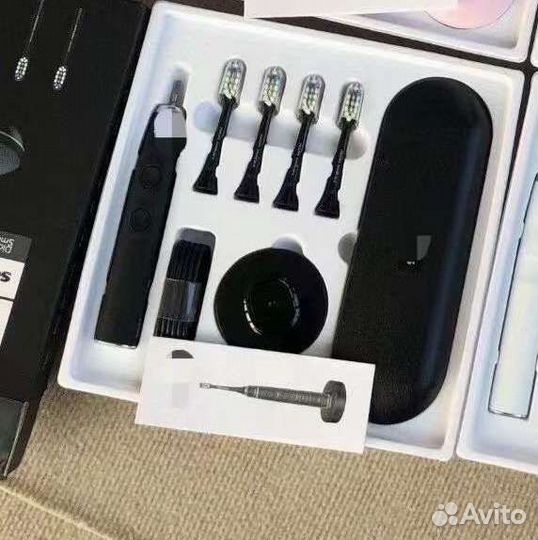 Электрическая зубная щетка Philips 9954