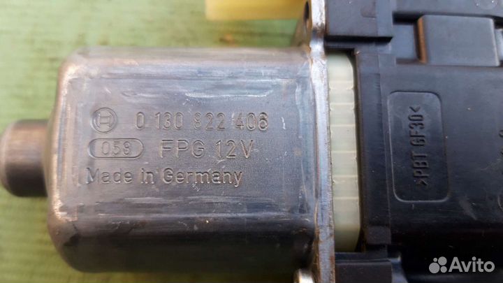 Моторчик стеклоподъемника передний Форд Фиеста