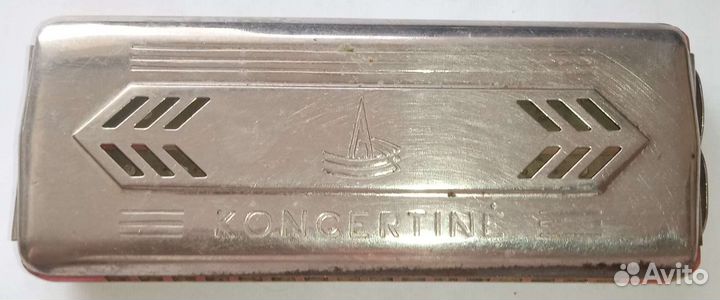 Старенькая губная гармошка Koncertine
