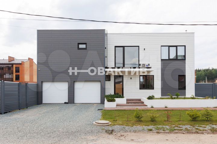 Коттедж 204 м² на участке 11 сот.