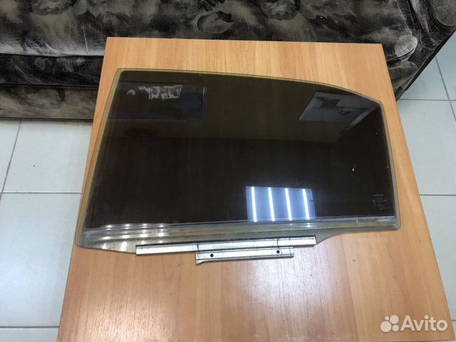 Стекло задней левой двери Toyota Camry 40