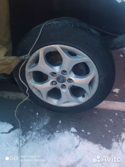 Диск литой форд фокус R 16