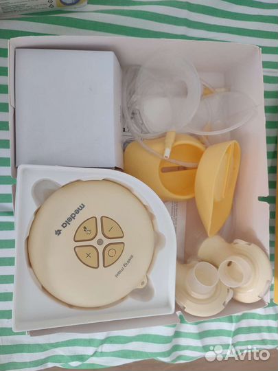 Молокоотсос medela swing flex электрический