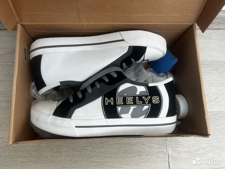 Роликовые кроссовки Heelys