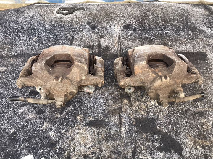 Суппорт тормозной передний Chevrolet Cruze