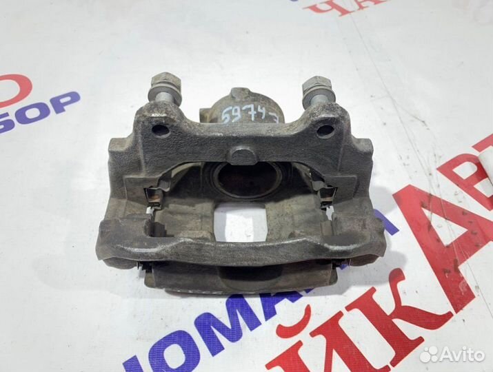 Суппорт тормозной передний левый Fiat Doblo