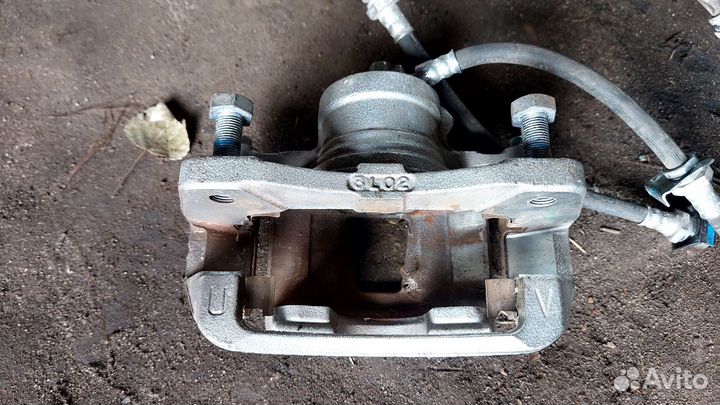 Суппорт тормозной передний. Lacetti. Daewoo Gentra