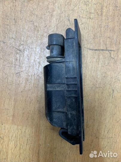 Фонарь подсветки номера Opel Vectra C