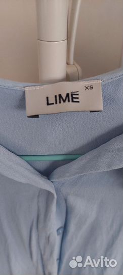 Блузка голубая