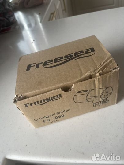 Кормушка для рыб автоматическая