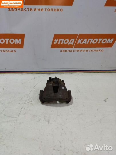 Суппорт тормозной передний правый Opel Astra