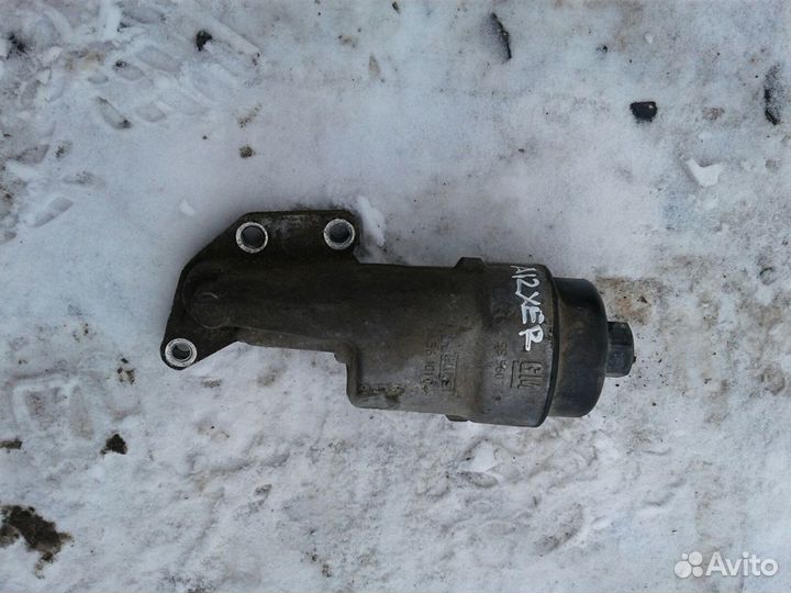Корпус масляного фильтра опель A12XER