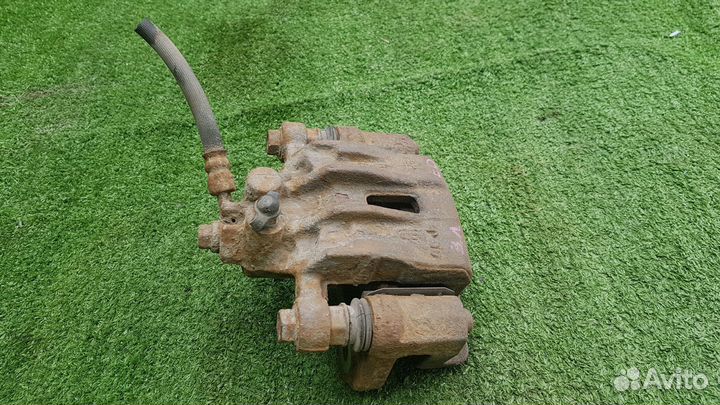 Задний левый тормозной суппорт kia ceed ED sw