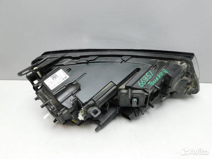 Фара левая Volkswagen Touareg