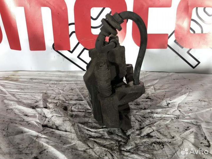 Суппорт тормозной передний левый Opel Astra J До