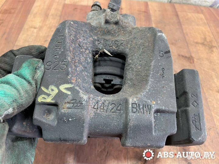 Суппорт тормозной задний левый BMW 7 F01/F02 F01