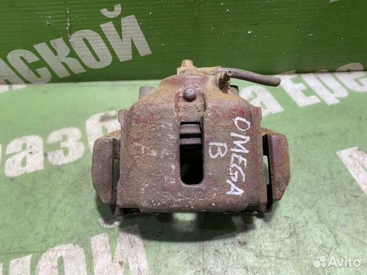 Суппорт тормозной передний правый Opel Omega B