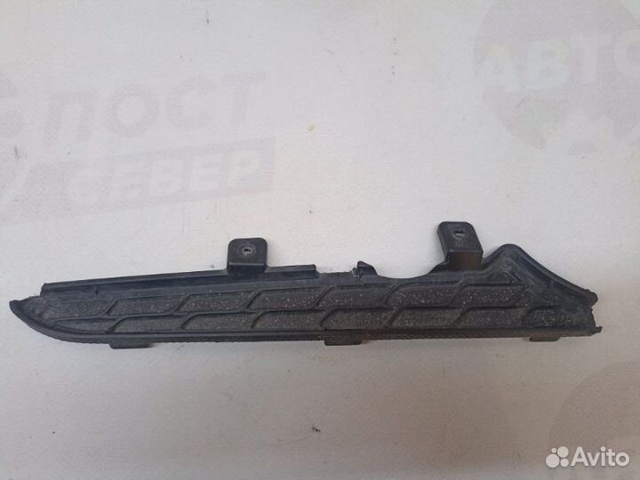 Кронштейн решетки радиатора левый Hyundai Solaris