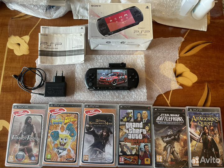 PSP E1008 прошитая и много игр 80 игр 64гб