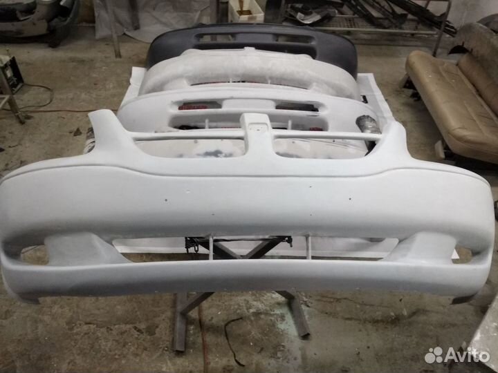 Бампер передний для Dodge caravan Chraysler voyage