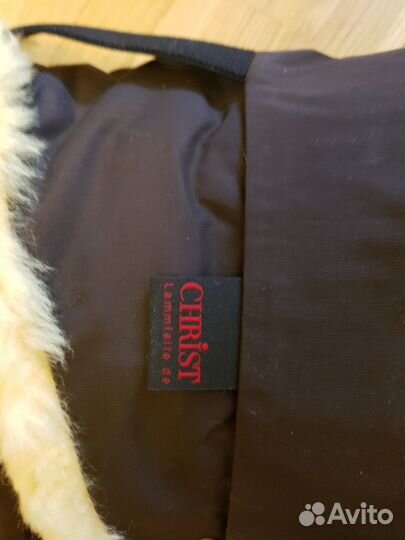 Меховой конверт в коляску фирмы Christ