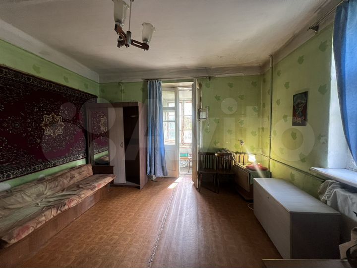 Доля в 2-к. квартире, 58 м², 2/2 эт.