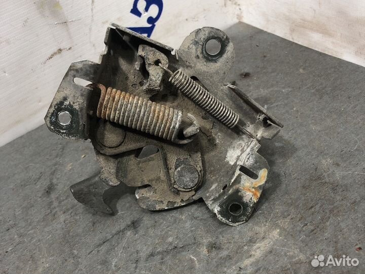 Замок капота lancer cedia