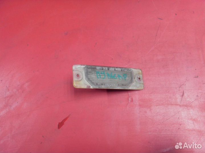 Фонарь подсветки номера 265103J100 Nissan Pulsar