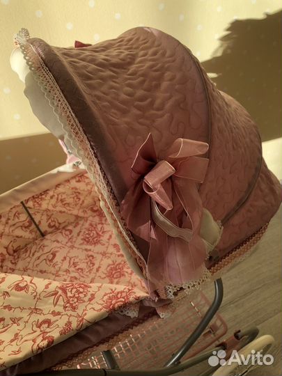 Игрушечная коляска для кукол