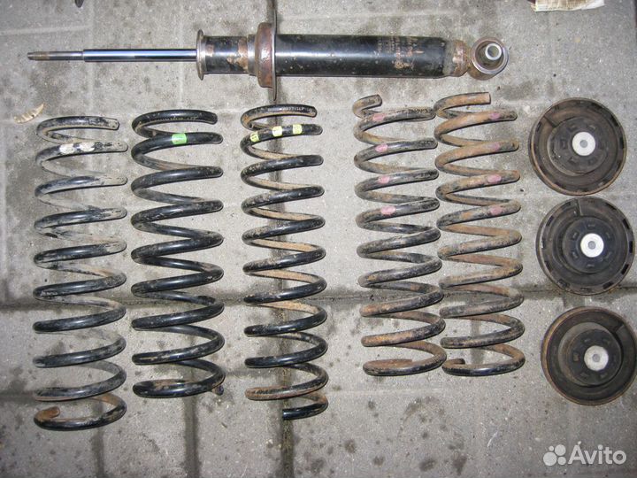 Стойки амортизаторов BMW E38 пружины опоры
