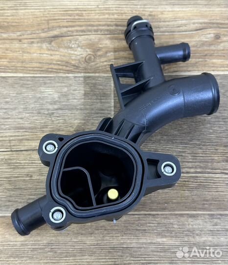 Распределитель системы охлаждения Опель 1,4 турбо