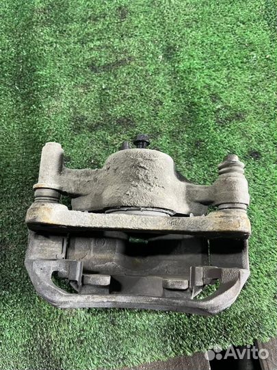 Суппорт передний левый Hyundai i20 1 (PB) 2008-201