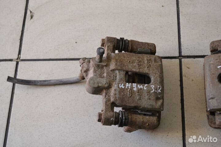 Chery IndiS (S18D) Тормозной суппорт задний